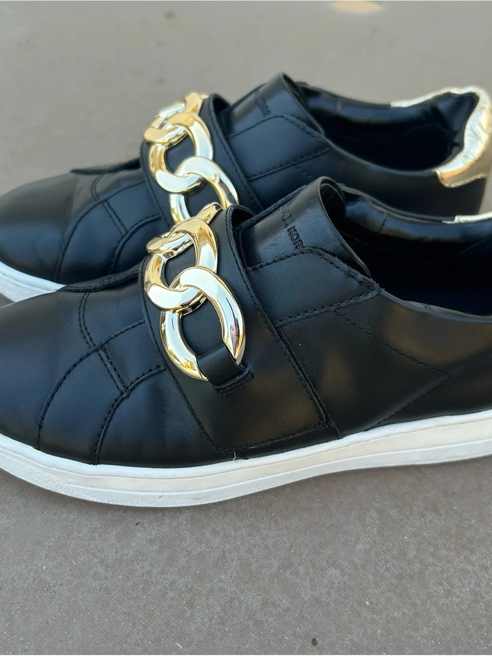 Michael Kors Kenna Black Leather Slip-On Sneakers with Gold Chain Accent Sz 8.5